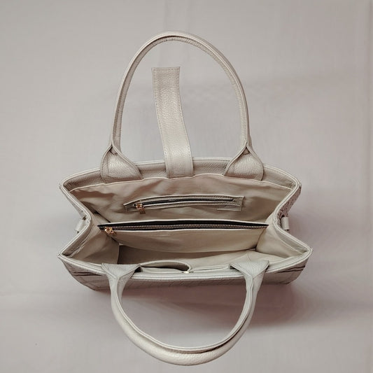 Tote grande piel vacuna